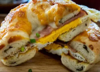 Cheesy Ham and Egg Bagel Recipe - TheRecipe.Website