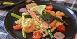 Salmon and Prawn Tagliatelle Recipe - TheRecipe.Website